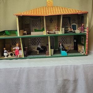 T Cohn Tin Litho Dollhouse 1951 with original furniture